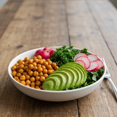 Vibrant vegan buddha bowl with colorful vegetables and seeds