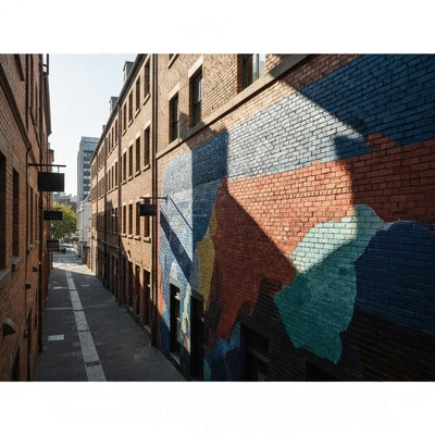 Vibrant colorful mural on a hidden laneway wall in Carlton